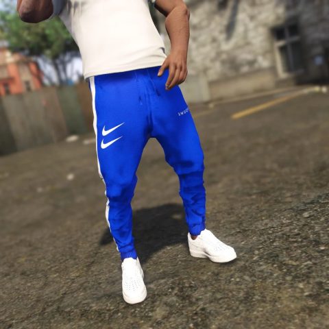 nike all over swoosh logo pants blue